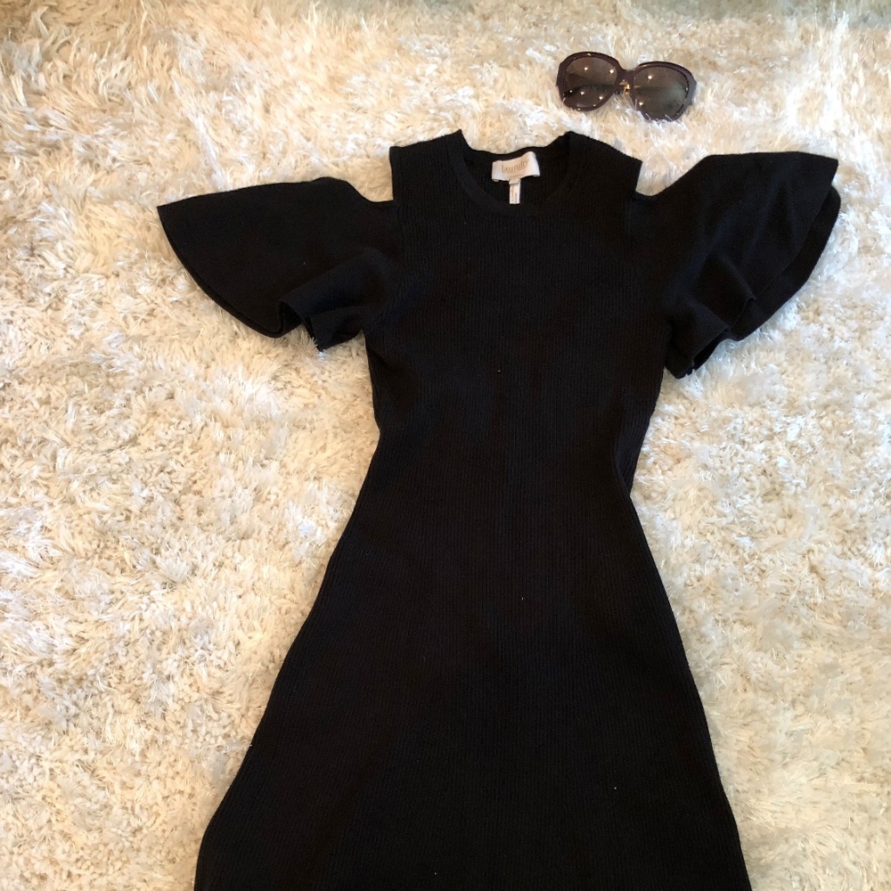 Laundry. Short black dress, with no shoulders.